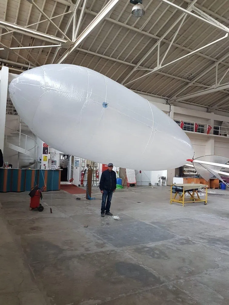 Full-size prototype airship envelope inflated inside a hangar